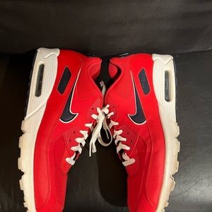 Men’s Nike Air Max red with navy swoosh; size 13